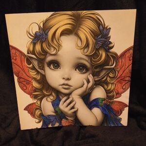 Hand Crafted Blonde Fairy Wall Art with Blue and Red Accents